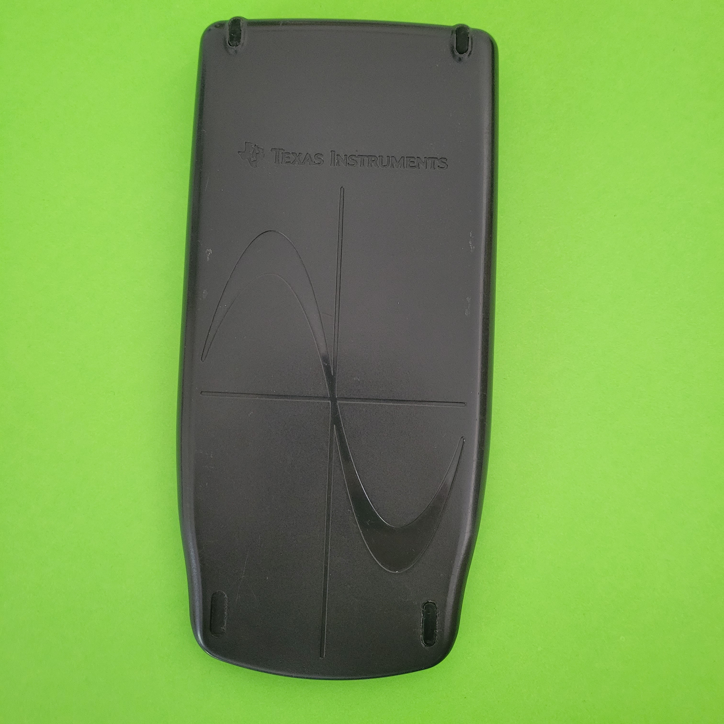 An image of the case of a texas instruments ti83 graphing calculator